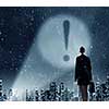 Businesswoman standing with back and exclamation mark in spotlight