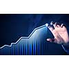 Close view of businessman touching screen with market infographs