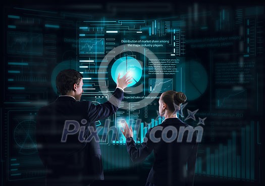 Rear view of businessman and businesswoman working with virtual panel interface