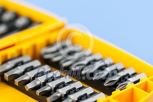 Closeup on phillips and robertson screwdriver insert bits of various sizes Closeup on phillips and robertson screwdriver insert bits of various sizes