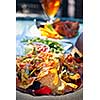 Basket of nachos and other appetizers on restaurant table