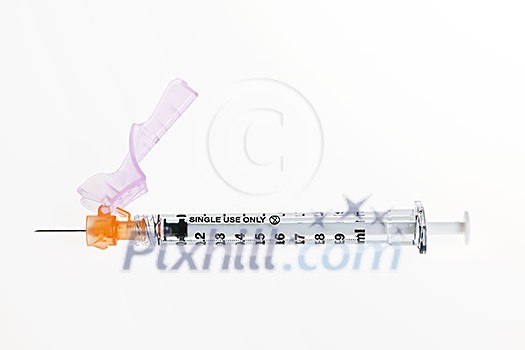 Medical single use safety syringe isolated on white background Medical single use safety syringe isolated on white background