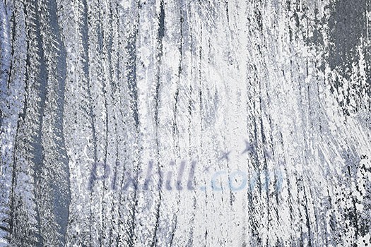 Textured background of distressed rustic wood with peeling blue and white paint