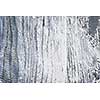 Textured background of distressed rustic wood with peeling blue and white paint