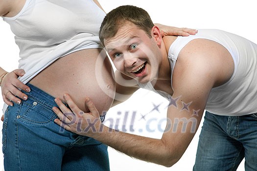 Happy smiling man with pregnant woman isolated on white Happy smiling man with pregnant woman isolated on white