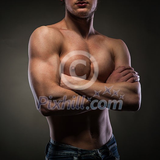 Muscular naked man on black Muscular naked man on black