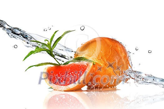 Water splash on grapefruit with mint isolated on white Water splash on grapefruit with mint isolated on white