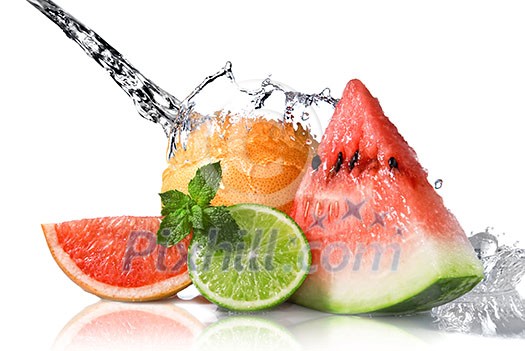 Water splash on fresh fruits isolated on white Water splash on fresh fruits isolated on white