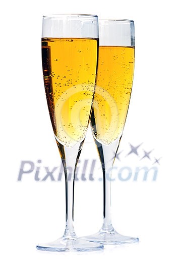 Two full champagne flutes isolated on white background Two full champagne flutes isolated on white background