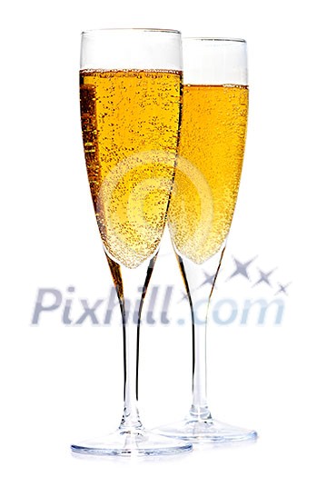 Two full champagne flutes isolated on white background Two full champagne flutes isolated on white background