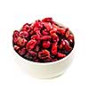 Bowl of dried cranberries isolated on white background
