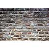 Old grey grunge brick wall background