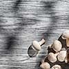 Mushrooms on wooden table, top view image