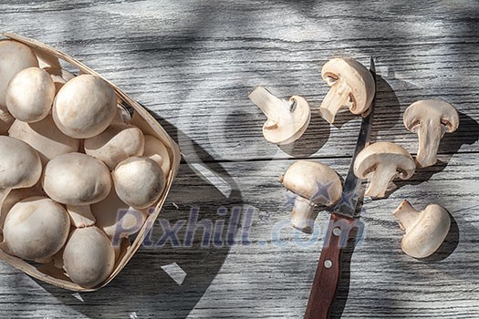 Mushrooms on wooden table, top view image Mushrooms on wooden table, top view image