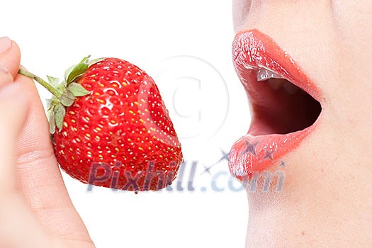 Young woman holding strawberry isolated on white Young woman holding strawberry isolated on white