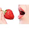 Young woman holding strawberry isolated on white