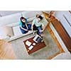 young couple at home with  modern livingroom indoor working on laptop on house finance and planing