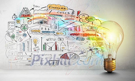 Glass glowing light bulb and business sketched ideas Glass glowing light bulb and business sketched ideas