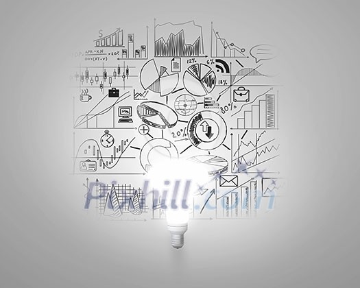 Glass glowing light bulb and business sketched ideas Glass glowing light bulb and business sketched ideas