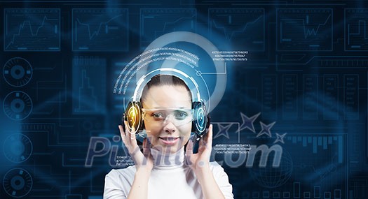 Young woman wearing headphones on virtual blue interface Young woman wearing headphones on virtual blue interface