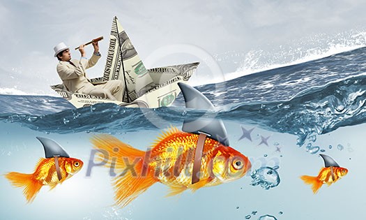 Concept of fake threat when businessman float in dollar ship and sharks in water appear to be goldfish Concept of fake threat when businessman float in dollar ship and sharks in water appear to be goldfish