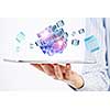 Businessman holding tablet and cube as symbol of problem solving
