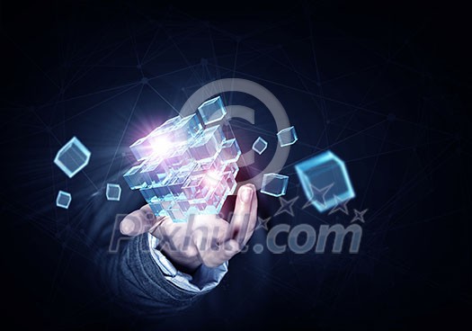 Businesswoman hand shows cube as symbol of problem solving Businesswoman hand shows cube as symbol of problem solving