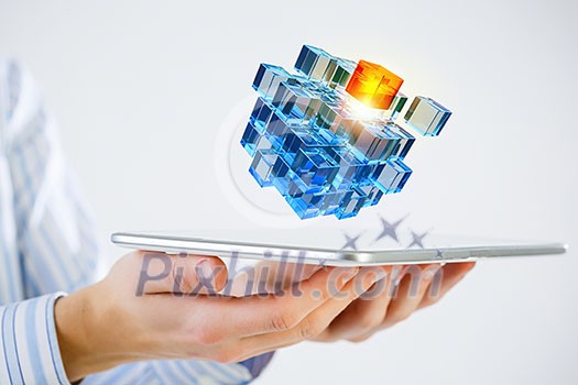 Businessman holding tablet and cube as symbol of problem solving Businessman holding tablet and cube as symbol of problem solving