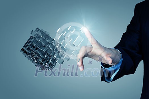 Businessman hand touch cube as symbol of problem solving Businessman hand touch cube as symbol of problem solving