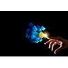Businesswoman hand touch cube as symbol of problem solving