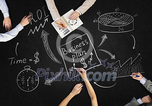 Top view of people hands drawing business teamwork strategy Top view of people hands drawing business teamwork strategy