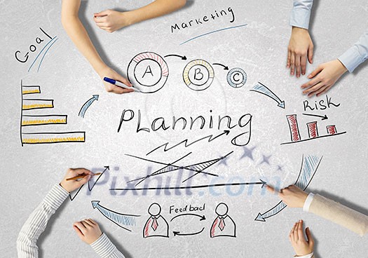 Top view of people hands drawing business teamwork strategy Top view of people hands drawing business teamwork strategy