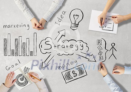 Top view of people hands drawing business teamwork strategy Top view of people hands drawing business teamwork strategy