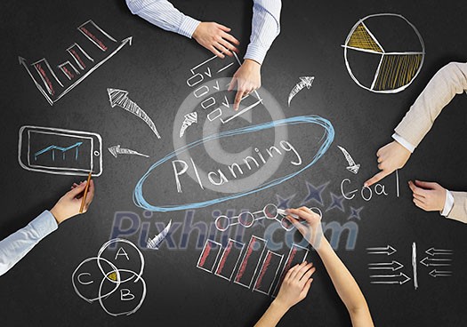 Top view of people hands drawing business teamwork strategy Top view of people hands drawing business teamwork strategy
