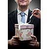 closeup portrait of businessman holding gift with woman hand