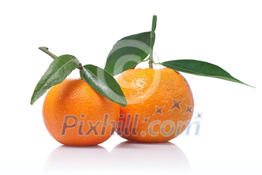 Tangerines with green leaves isolated on white Tangerines with green leaves isolated on white