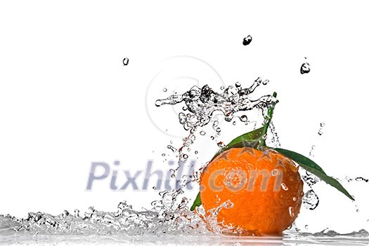 Tangerine with green leaves and water splash isolated on white Tangerine with green leaves and water splash isolated on white
