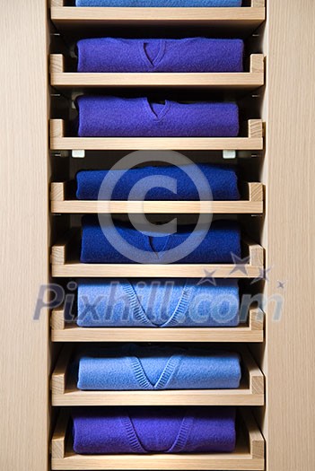 store shelf with color clothes store shelf with color clothes