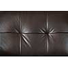 Closeup of luxurious expensive brown leather furniture, background