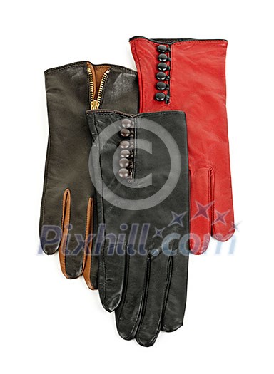 Assorted leather female gloves isolated on white background Assorted leather female gloves isolated on white background