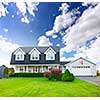 Beautiful two storey residential house with dormers and attached garage