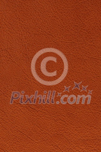 Brown natural leather background or texture close up Brown natural leather background or texture close up