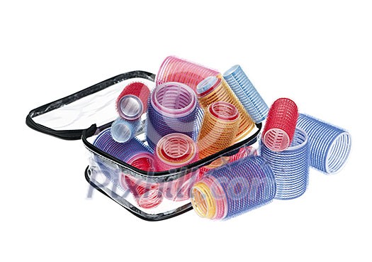 Case of colorful hair rollers isolated on white background Case of colorful hair rollers isolated on white background