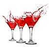 Red cocktail with splash isolated on white
