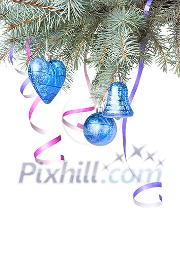 Christmas balls and decoration on fir tree branch isolated on white Christmas balls and decoration on fir tree branch isolated on white