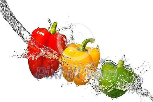 red, yellow and green pepper with water splash isolated on white red, yellow and green pepper with water splash isolated on white