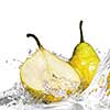 yellow pear with water splash isolated on white