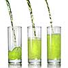 green juice pouring into glass isolated on white