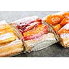Closeup on slices of flaky fruit strudel desserts