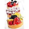 Closeup of fancy gourmet fresh fruit dessert tarts
